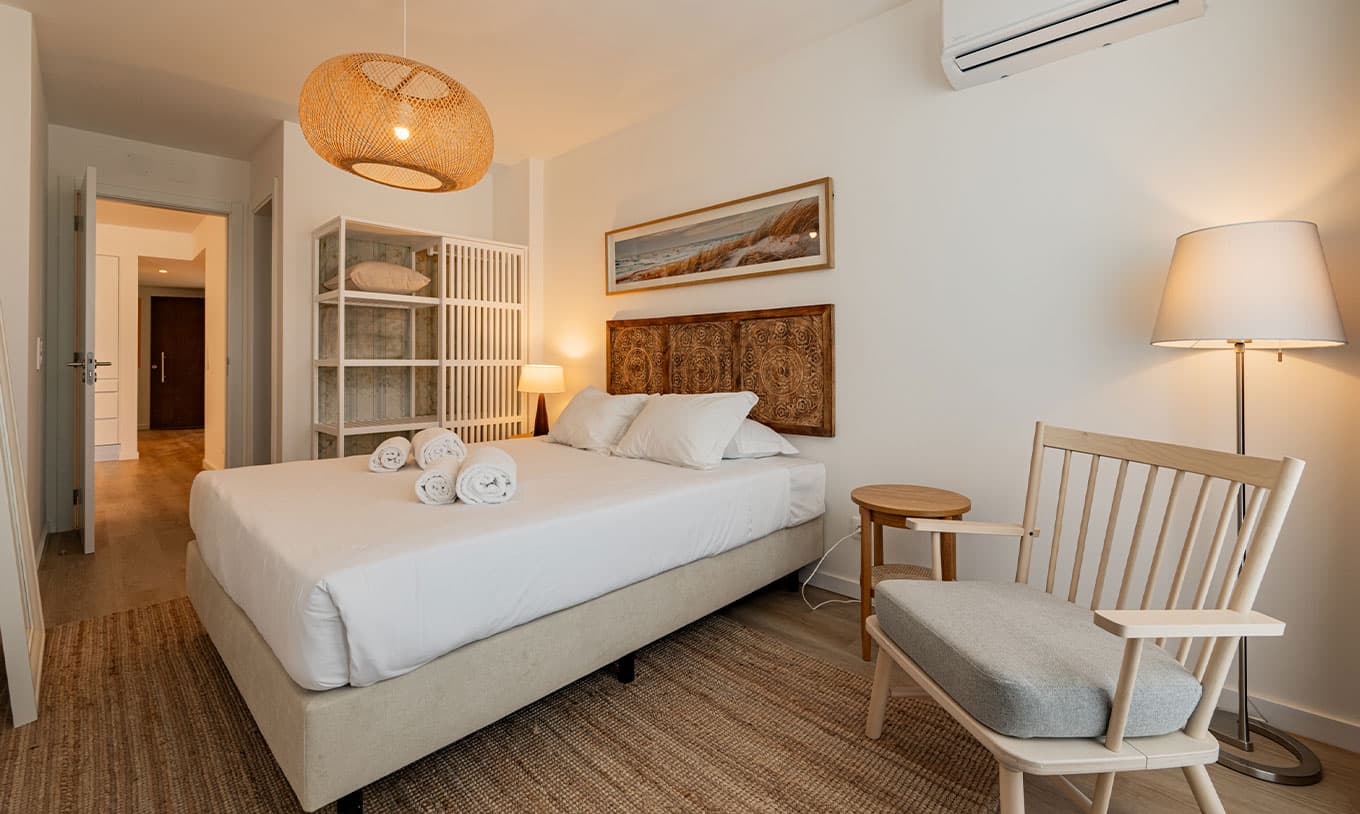Second bedroom in the premium apartment with soft natural light
