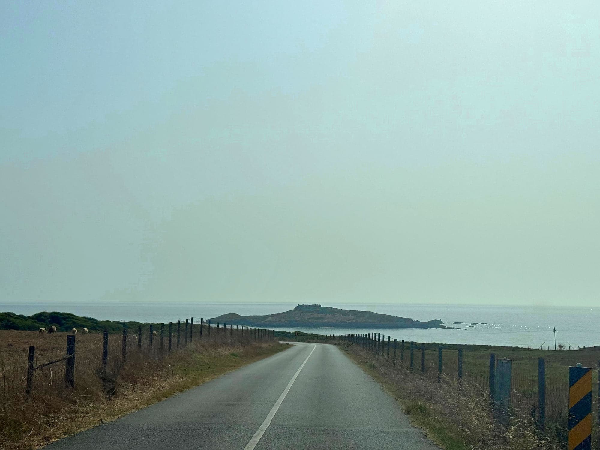 The coast road running towards Pessegueiro Island near Porto Covo