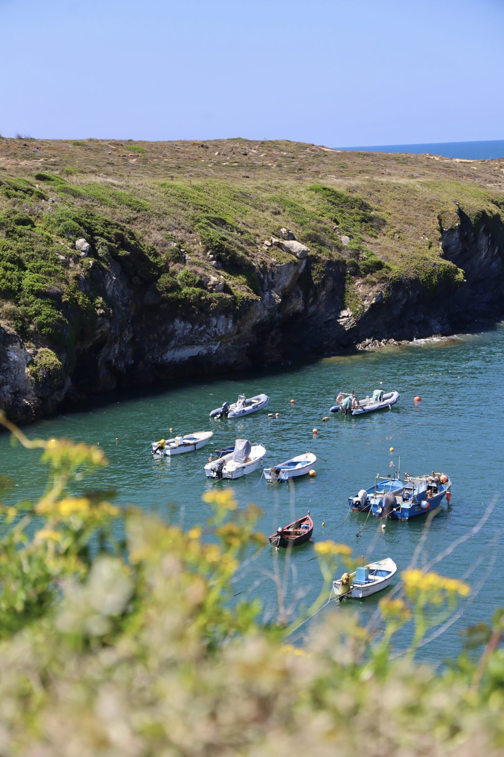 The fishing harbour below the cliffs