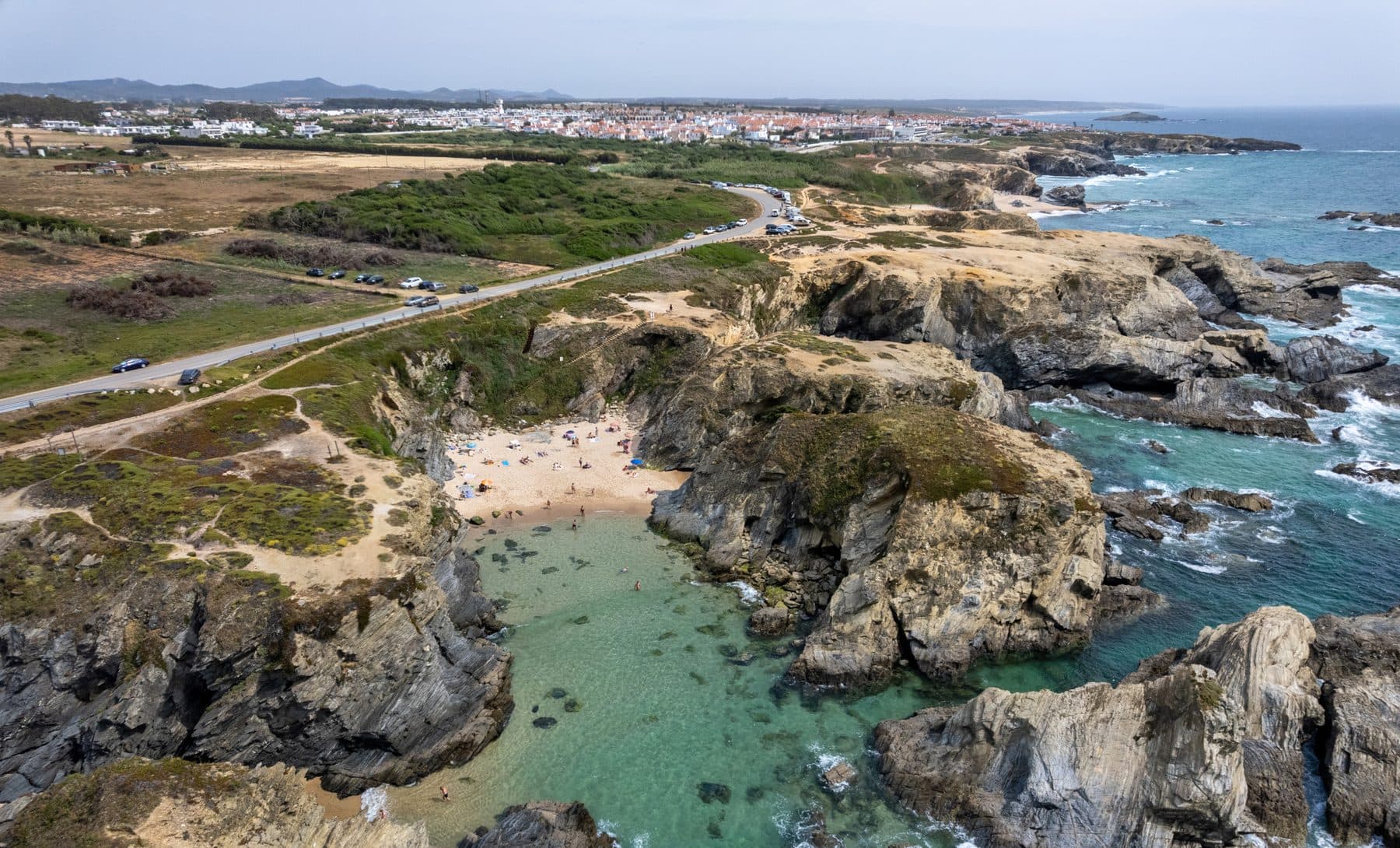 The tiny cove of Porto Covinho from the clifftop